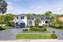 Completely remodeled to modern luxury, this large 4 bedroom, 3.5 for sale in Palm Beach Gardens Florida Palm Beach County County on GolfHomes.com