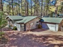 Nestled in the heart of Pinetop Country Club, this single-level for sale in Pinetop Arizona Navajo County County on GolfHomes.com