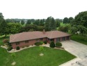 Step into timeless elegance with this beautifully crafted home for sale in Waukon Iowa Allamakee County County on GolfHomes.com