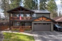 Located  across the street from Hayden Lake, this exceptional, Idaho