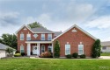 Poised on a premium lot backing to the 5th green of Bear Creek for sale in Wentzville Missouri St. Charles County County on GolfHomes.com