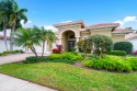 This meticulously maintained & modern  5-bed 3.1-bath courtyard for sale in Delray Beach Florida Palm Beach County County on GolfHomes.com