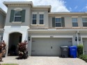Highly upgraded and well-kept two story two car garage townhouse for sale in Hollywood Florida Broward County County on GolfHomes.com