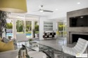 Discover the epitome of desert luxury in this stunning for sale in Palm Springs California Riverside County County on GolfHomes.com