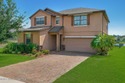 Lakefront Beauty with Bonus Loft & Sunset Views in Sawgrass for sale in West Melbourne Florida Brevard County County on GolfHomes.com