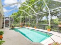 POOL HOME IN NORTH NAPLES FOR UNDER $500,000!!! Spacious 2 for sale in Naples Florida Collier County County on GolfHomes.com