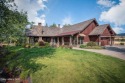 FULLY-FURNISHED RANCHER LOADED WITH CONTEMPORARY UPGRADES AT for sale in Coeur d Alene Idaho Kootenai County County on GolfHomes.com