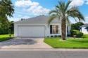 This home is located in Sandpiper, a 55+ Community!  The for sale in Lakeland Florida Polk County County on GolfHomes.com