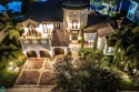 Magnificent custom home in PGCC. This mini mansion offers 6 for sale in Parkland Florida Broward County County on GolfHomes.com