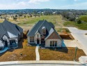 WELCOME to your luxurious retreat in a prestigious gated for sale in Weatherford Texas Parker County County on GolfHomes.com