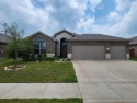 This wonderful four bedroom home with a much coveted 3 car for sale in Cleburne Texas Johnson County County on GolfHomes.com