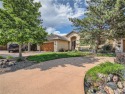 Peaceful, low maintenance ranch style home with walk-out for sale in Morrison Colorado Jefferson County County on GolfHomes.com