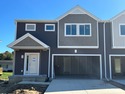 This new townhome blends modern design with everyday convenience for sale in Marshall Michigan Calhoun County County on GolfHomes.com