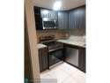 This fabulous 1 bedroom 1 1/2 bathroom condo is situated in an for sale in Lauderhill Florida Broward County County on GolfHomes.com