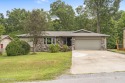 This 3-bedroom, 2-bath home has 1,676 sq. ft. of living space for sale in Bella Vista Arkansas Benton County County on GolfHomes.com