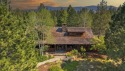 Welcome to the Cayuse Cabin. This lovely 4-bedroom, 4-bathroom for sale in Hamilton Montana Ravalli County County on GolfHomes.com