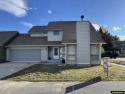 Welcome home to this thoughtfully updated tri-level townhouse for sale in Riverton Wyoming Fremont County County on GolfHomes.com
