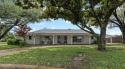 Set on a premier .4-acre lot along the 3rd green and 4th tee box for sale in Fort Worth Texas Tarrant County County on GolfHomes.com