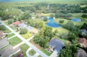 Beautiful golf course view of three greens and a pond of Citrus for sale in Homosassa Florida Citrus County County on GolfHomes.com