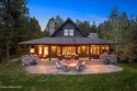 A Gozzer Ranch Golf and Lake Club custom home with beautiful for sale in Harrison Idaho Kootenai County County on GolfHomes.com
