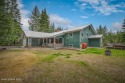 This impeccably maintained Priest Lake home perfectly blends for sale in Priest Lake Idaho Bonner County County on GolfHomes.com