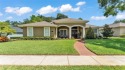 Life in Eaglebrook feels easy here. This 4-bedroom, 3-bathroom for sale in Lakeland Florida Polk County County on GolfHomes.com