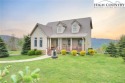 Sunset views, solar power, and space for everyone--this for sale in West Jefferson North Carolina Ashe County County on GolfHomes.com