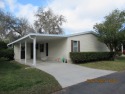 PRICE REDUCED!  This is a 1310 sqft, Palm Harbor home with 3 for sale in Zephyrhills Florida Pasco County County on GolfHomes.com