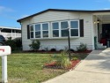 This property boasts numerous desirable features. New Roof 2023 for sale in Barefoot Bay Florida Brevard County County on GolfHomes.com
