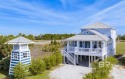 This spacious BEACH HOUSE has the best of both worlds in for sale in Gulf Shores Alabama Baldwin County County on GolfHomes.com