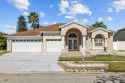 Nestled in the highly sought-after GOLF community of Lexington for sale in Wesley Chapel Florida Pasco County County on GolfHomes.com