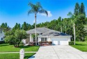 Welcome to 18910 Saint Laurent Dr, a beautifully maintained for sale in Lutz Florida Hillsborough County County on GolfHomes.com