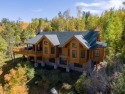 This stunning log home offers the perfect combination of privacy for sale in Silverthorne Colorado Summit County County on GolfHomes.com