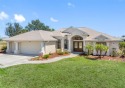 Nestled in a highly sought-after executive golf course community for sale in Rotonda West Florida Charlotte County County on GolfHomes.com