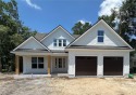 This stunning two-story home by renowned local builder Josselyn for sale in Kingsland Georgia Camden County County on GolfHomes.com