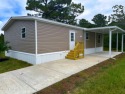 Welcome to this breathtaking, open-concept Modern home built for sale in Brooksville Florida Hernando County County on GolfHomes.com