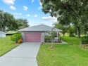 Charming 2 bedroom, 2 bath home with garage located on the 11th for sale in Lakeland Florida Polk County County on GolfHomes.com