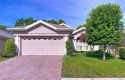 Spacious, gracious 2/2/2 + den pool home, on 14th green of for sale in Spring Hill Florida Hernando County County on GolfHomes.com