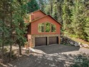 Custom home in the woods and close to Lake Cascade. 4 bedrooms for sale in Cascade Idaho Valley County County on GolfHomes.com