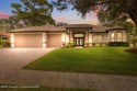 Tucked within the exclusive gated community of Silverthorn, this for sale in Spring Hill Florida Hernando County County on GolfHomes.com