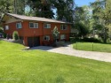 Nestled in a park-like setting just minutes from Pinehurst Golf for sale in Pinehurst Idaho Shoshone County County on GolfHomes.com