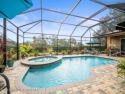 This Glen Lakes Estate Home features a BRAND-NEW ROOF completed for sale in Spring Hill Florida Hernando County County on GolfHomes.com