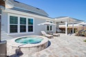 This upscale coastal home is an ideal address for entertaining for sale in Watersound Beach Florida Walton County County on GolfHomes.com