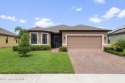 Welcome to this stunning 2022-built home in The Preserves at for sale in Palm Bay Florida Brevard County County on GolfHomes.com