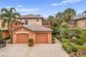 Welcome to your dream home in the highly sought-after gated for sale in Estero Florida Lee County County on GolfHomes.com