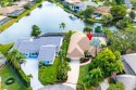 Situated on a cul-de-sac and oversized lot of nearly 1/3 of an for sale in Palm Beach Gardens Florida Palm Beach County County on GolfHomes.com