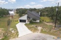 NEW LOWER PRICE - MOTIVATED SELLER! Perfect home for the empty for sale in Blanco Texas Blanco County County on GolfHomes.com