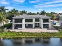 Welcome to your dream home in the exclusive Heron Estates. This for sale in Parkland Florida Broward County County on GolfHomes.com