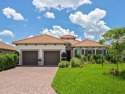Welcome to an exquisite, upgraded residence in the Rosedale Golf for sale in Bradenton Florida Manatee County County on GolfHomes.com