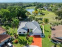 Come take a look at a private cul-de-sac water view home with a for sale in Tamarac Florida Broward County County on GolfHomes.com